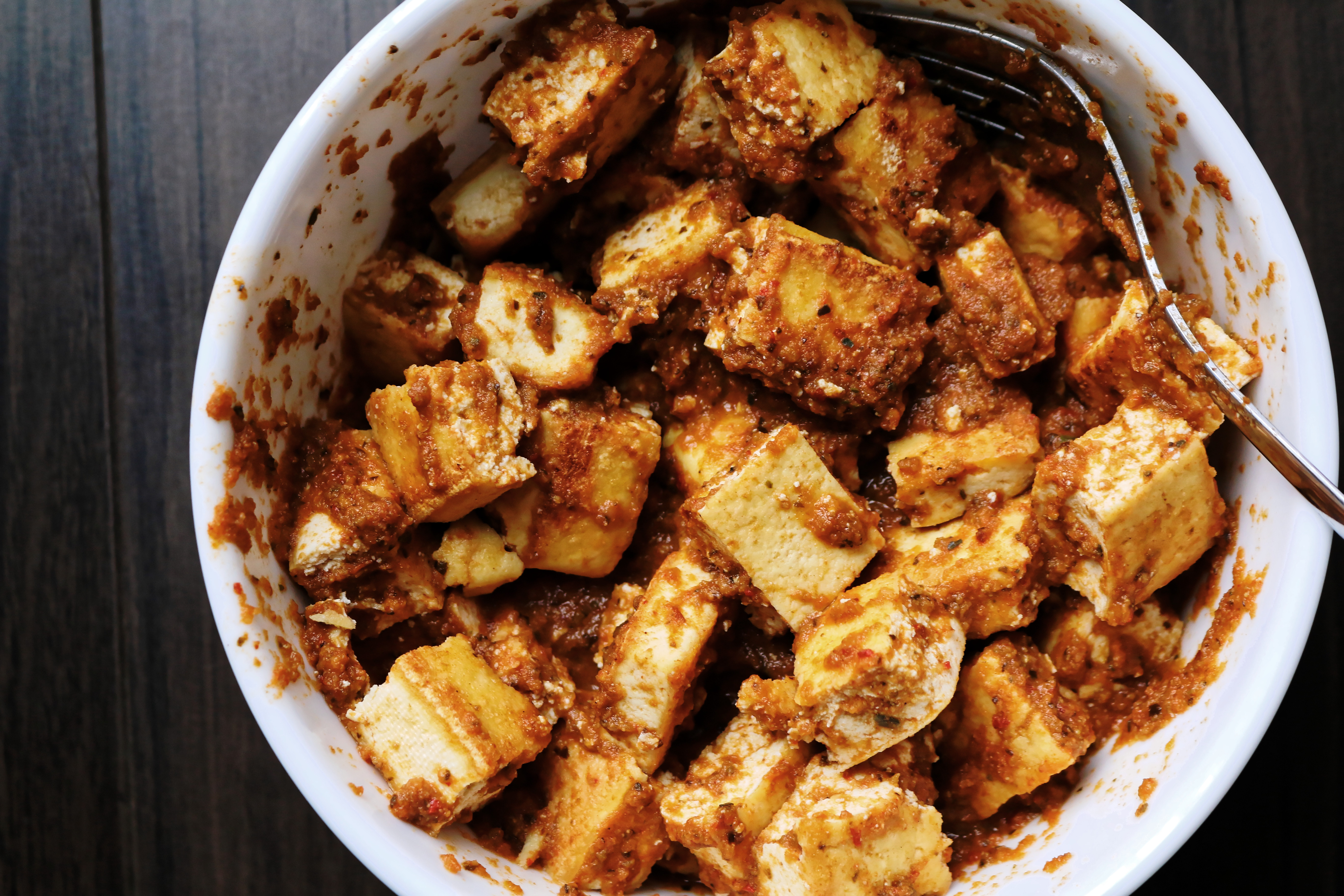 Marinate tofu mexican sofrita in white bowl